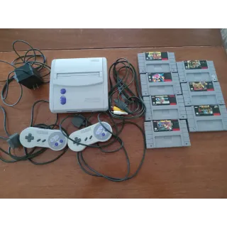 Super Nintendo Junior System with seven games- all tested and works