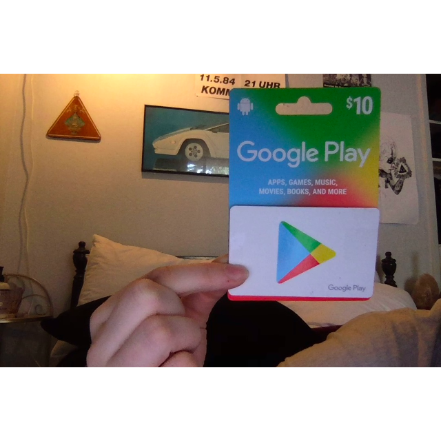 Google Play Card In Hand