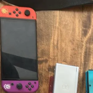 Nintendo switch oled, switch only. (Comes with case and three games.)