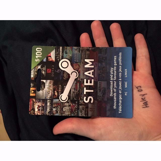 Steam gift card in a hand – Stock Editorial Photo © dennizn #254479392