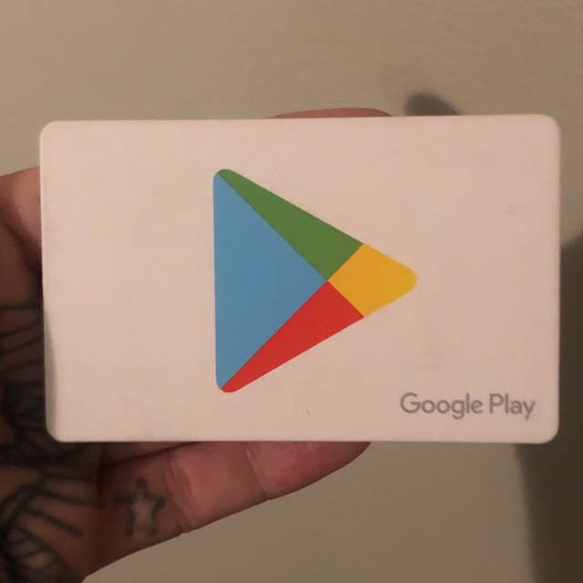 Google Play Card In Hand