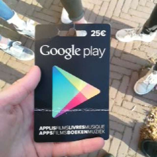 Google Play Card In Hand