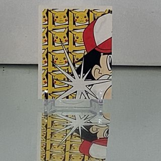 Piece of Ash Ketchum - 1999 Pokemon Sticker Topps Merlin